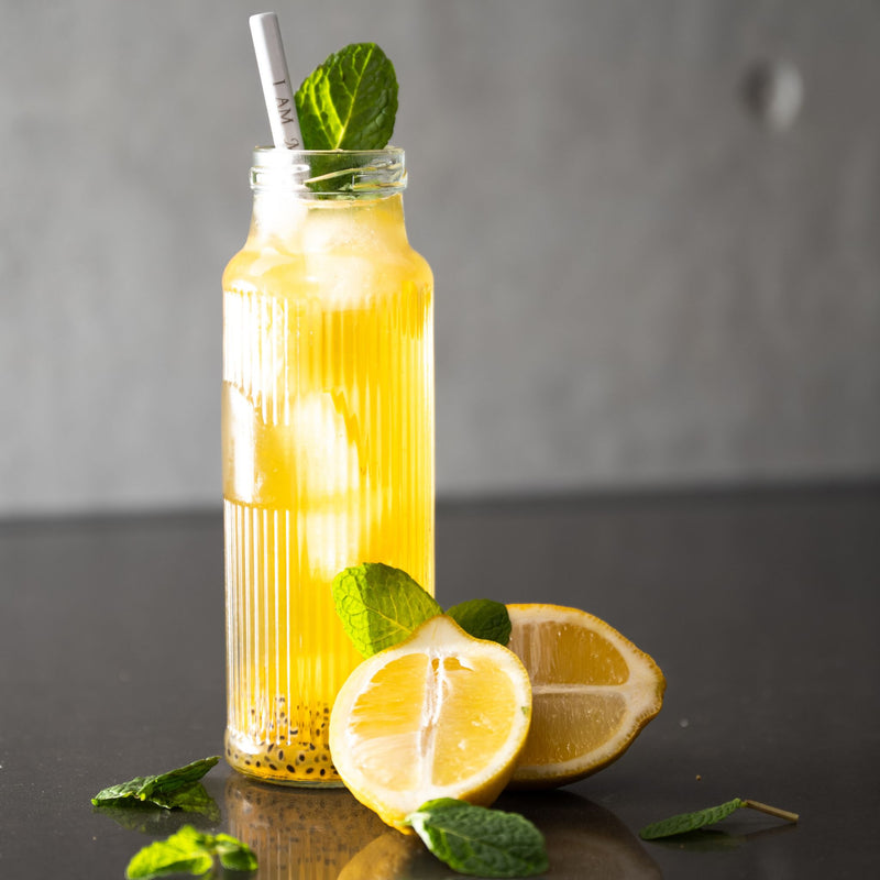 I AM WORTHY reusable affirmation straw in a glass